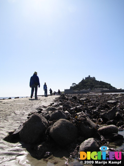 SX09103 People walking on causeway to St Michael's Mount